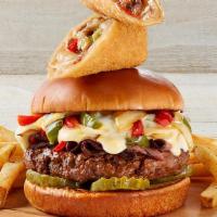 Philly Cheesesteak Burger · Our tasty burger loaded & piled high with layers of roast beef, onions, red & green bell pep...