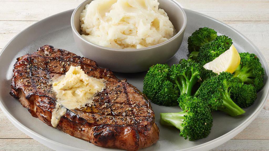 New York Strip · 12 ounce strip topped with Parmesan Butter. Served with mashed potatoes and lemon-butter broccoli.