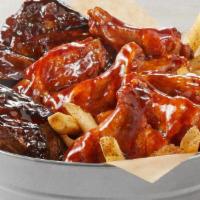 Bucket Of Bones · FRIDAYS BIG RIBS and traditional wings served with seasoned fries. Choose your rib sauce and...