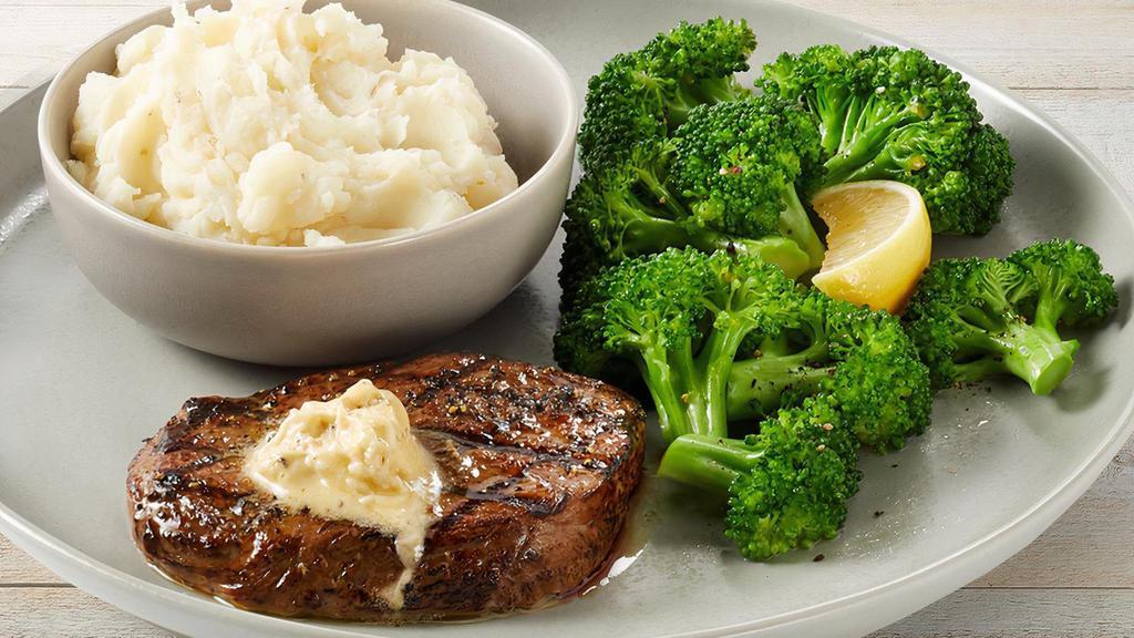 Center-Cut Sirloin · 6 ounces of flavorful center-cut sirloin topped with Parmesan Butter. Served with mashed potatoes and lemon-butter broccoli.