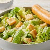 Caesar Salad · Romaine, Parmesan-Romano, Caesar dressing, Asiago croutons and Parmesan crisps. Served with ...