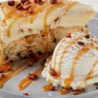 Cinnabon Caramel Pecan Cheesecake · Layers of Cinnabon cinnamon cheesecake and vanilla crunch cake topped with signature cream c...