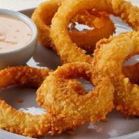 Giant Onion Rings · Served with BBQ Ranch.