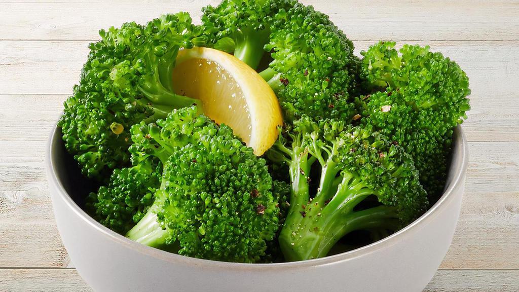 Lemon-Butter Broccoli · Fresh steamed broccoli with Parmesan Butter and lemon.