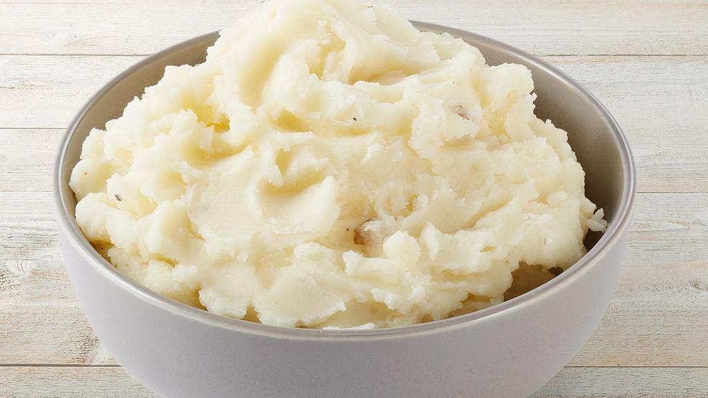 Mashed Potatoes · Creamy mashed potatoes blended with cheddar cheese, sour cream and real butter.
