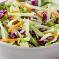 Coleslaw · Slaw mix of red and green cabbage, shredded carrots and fresh spinach tossed in creamy coles...