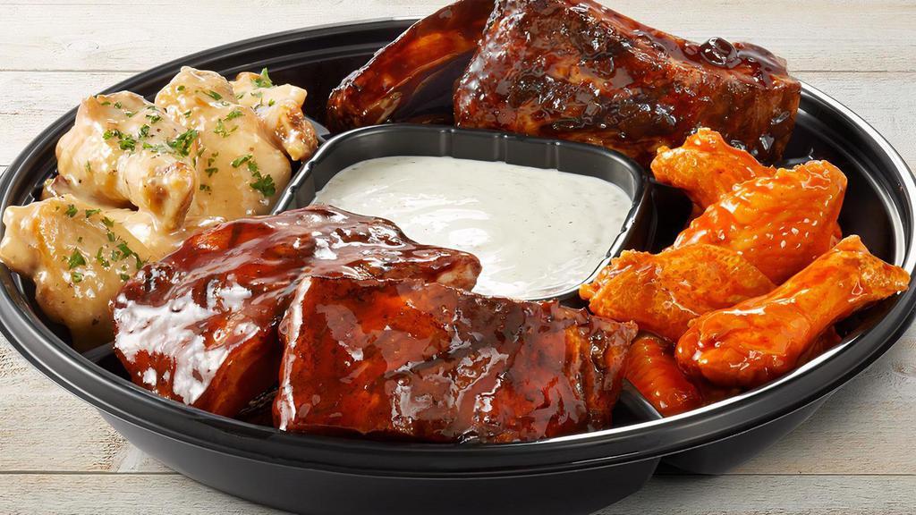 The Bones Platter - Small · Whiskey Glazed Ribs, Apple Butter Ribs & Traditional wings with Choice of Sauce