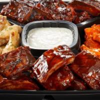 The Bones Platter - Large · Whiskey Glazed Ribs, Apple Butter Ribs & Traditional wings with Choice of Sauce