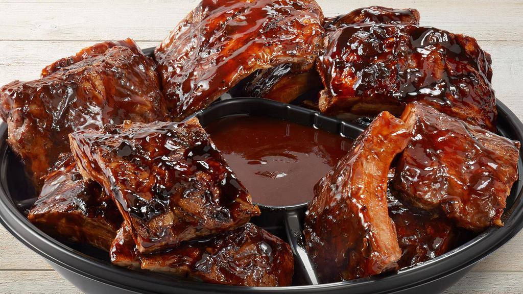 Whiskey Glaze & Bbq Ribs Platter - Small · Slow-cooked, fall-off-the-bone tender big back pork ribs. Combination of Whiskey-Glazed and Apple Butter BBQ.