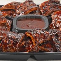 Whiskey Glaze & Bbq Ribs Platter - Large · Slow-cooked, fall-off-the-bone tender big back pork ribs. Combination of Whiskey-Glazed and ...