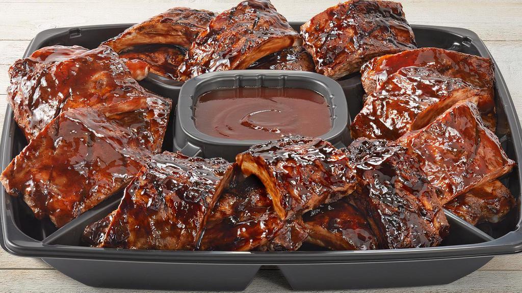 Whiskey Glaze & Bbq Ribs Platter - Large · Slow-cooked, fall-off-the-bone tender big back pork ribs. Combination of Whiskey-Glazed and Apple Butter BBQ.