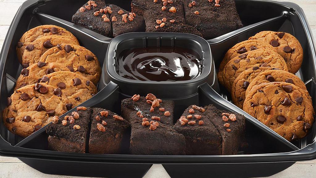 Dessert Platter - Large · Fudge Brownies topped with pecans & Chocolate Chip Cookies. Served with chocolate sauce.