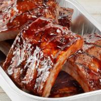 Apple Butter Bbq Ribs Party Tray · Double-basted pork ribs with Apple Butter BBQ sauce.