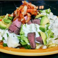 Beef & Bleu Salad · Assorted crisp greens served with bleu cheese dressing & topped with grilled tri-tip, avocad...