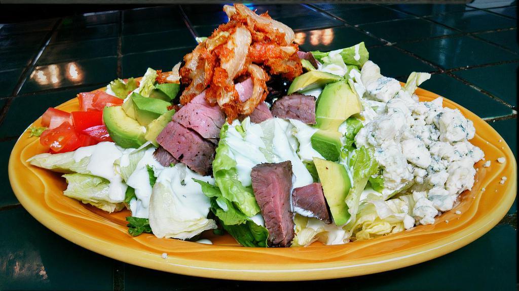 Beef & Bleu Salad · Romaine lettuce mix with bleu cheese dressing, roasted tri-tip, avocado, diced tomato, crumbled bleu cheese and deep fried onion strings.