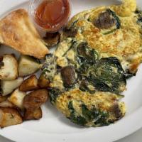 Spinach & Mushroom Omelette · Served with Spinach, Mushroom and a side of our homemade potatoes and bread.
(Only Available...