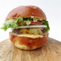 Almond Dip Burger · A juicy burger made from a unique blend of premium cuts of chuck & brisket with melted chedd...