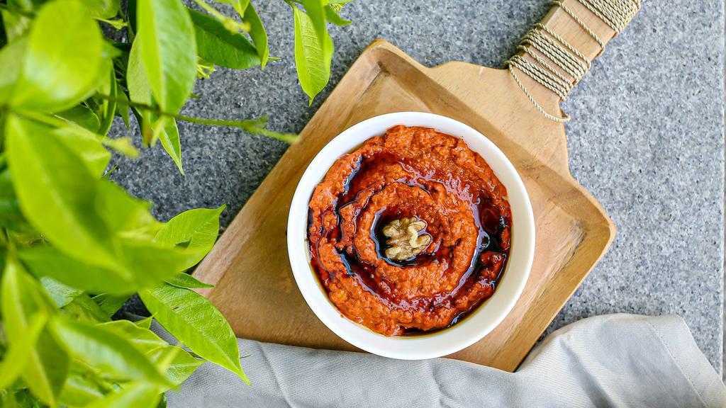 Red Pepper Dip · Homemade roasted red pepper dip (Muhammara) with garlic, tahini, pomegranate sauce and walnut. Contains gluten and nuts! (Vegan.)