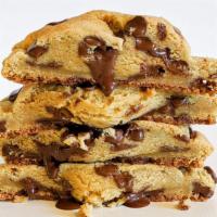 Chocolate Chip Cookies · Four fresh extra-large chocolate chip cookies taken straight from the oven and delivered rig...
