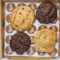 Half and Half · A box of two chocolate chip cookies paired with two delicious triple choc cookies!