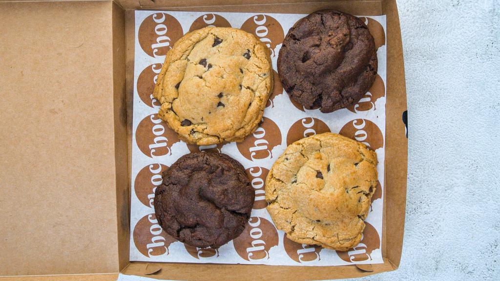 Half and Half · A box of two chocolate chip cookies paired with two delicious triple choc cookies!