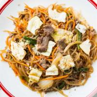 Japchae · Clean noodles stir fried with beef and vegetable.