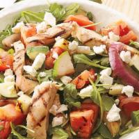 Chicken Salad · Grilled chicken, locally grown greens, Roma tomatoes, and cucumbers topped with crunchy crou...