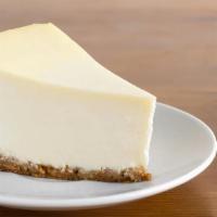 New York Cheesecake · Classic creamy cheesecake filling with a buttery crust.