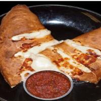 Vegetarian Calzone · Vegetarian. Tomato sauce, Mozzarella cheese, mushrooms, bell peppers, red onions, and black ...