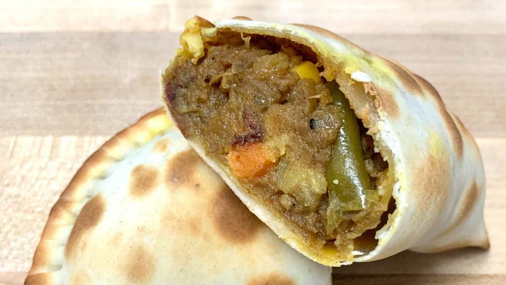 Argentinian Beef Empanada · 280 cal. Beef, bell pepper, green bean, caper, olive, onion, garlic, spices and special sauce.