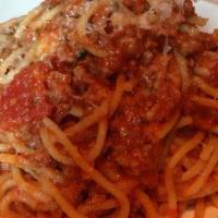 Spaghetti Bolognese · Meat ragu, shaved parmesan
