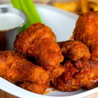 Spicy Chicken Wings · Mirchi’s favorite. With Mirchi’s ranch sauce, carrots, and celery sticks choose a style: ori...