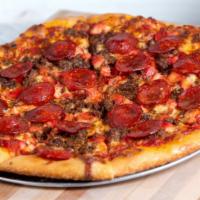 Meat Me up Pizza · Mirchi’s favorite. Pepperoni, ground beef, and chicken with traditional marinara sauce.