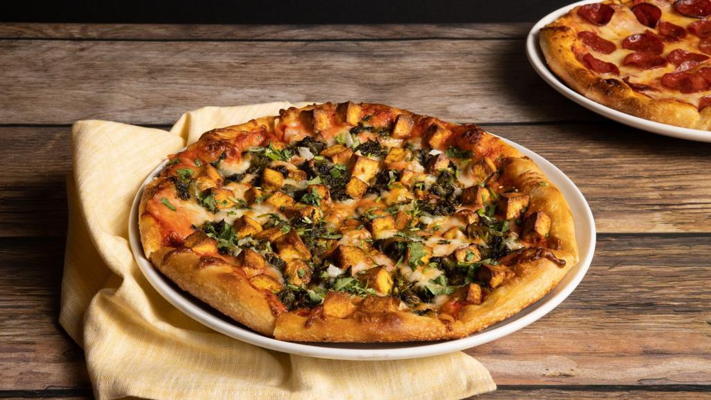 Palak Paneer Pizza · Mirchi’s Favorite, Veggie. Spicy spinach mixture, paneer cubes, and creamy masala sauce.