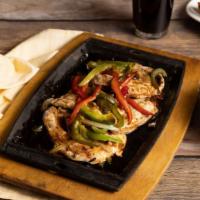 Sizzling Chicken Steak · Grilled chicken breast served on a sizzling plate with onions, bell peppers, and black peppe...