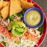 Chicken Salad · Chicken with romaine lettuce, our tequila dressing, tomatoes, avocado, slaw mix & tortilla c...