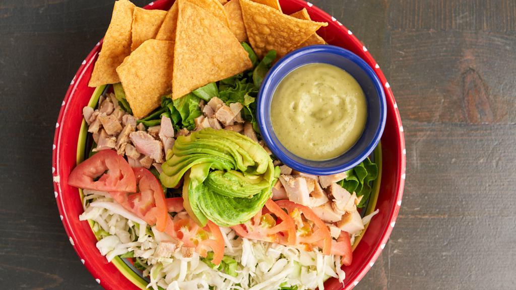Chicken Salad · Chicken with romaine lettuce, our tequila dressing, tomatoes, avocado, slaw mix & tortilla chip.