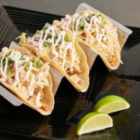 Tacos (3) (Chicken) · All tacos come with salsa, onions, cilantro, house made slaw & cotija cheese & sour cream.