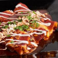 Enchiladas (Pork Belly) · (3) Red Enchiladas Filled With Cheese and Pork Belly