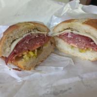 Little Rocket Man · Is an explosion of hot salami, spicy coppa, vinaigrette, pepperoncini, fresh tomatoes, and p...