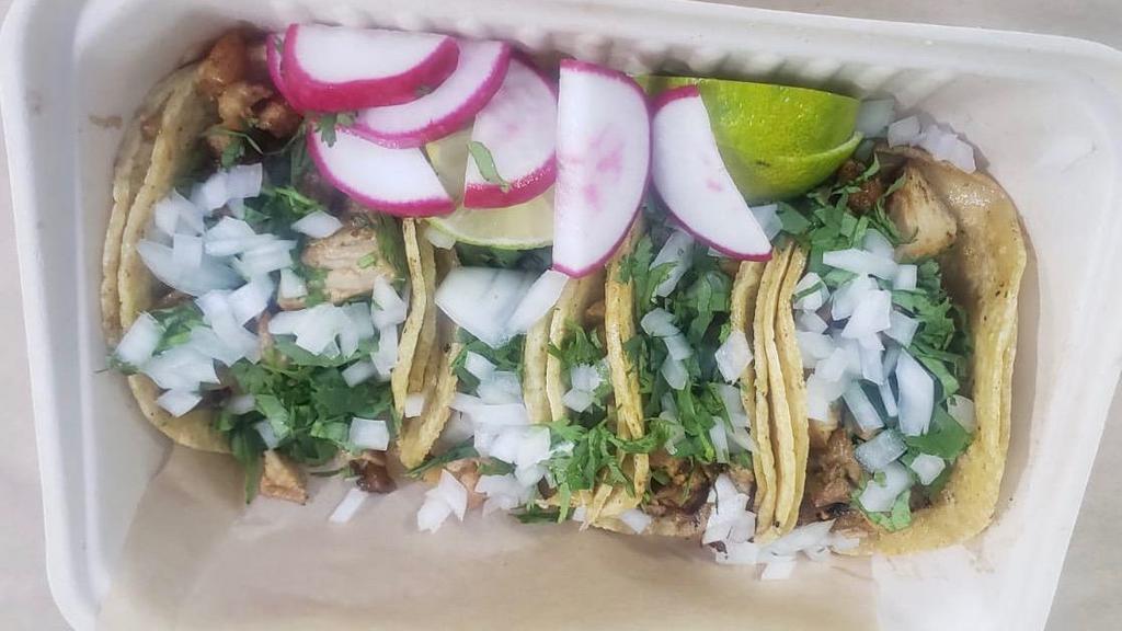 Taco plate beef · 4 tacos with cilantro, onions, 
Radishes ,limes ,