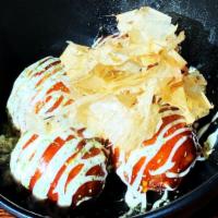 Takoyaki · Wheat batter octopus balls with mayonnaise, Takoyaki sauce, Bonito.