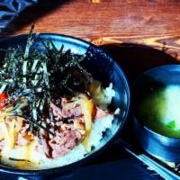 Gyudon · Thin juicy ribbon ribeye beef and onions slowly simmered in a sweet & savory soy broth