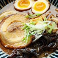 Black Garlic Tonkotsu  · Ramen with rich pork & chicken bone broth, Shoyu Dare, black garlic oil, Menma, Kikurage mus...