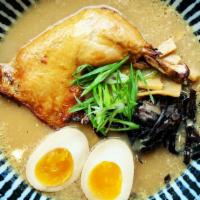 Tonkotsu  · Ramen with rich pork & chicken bone broth,
Shoyu Dare, Kikurage mushrooms, Menma,
green onio...