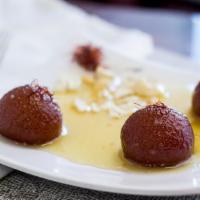 Gulab Jamun · Fried cheese balls in sugar syrup.