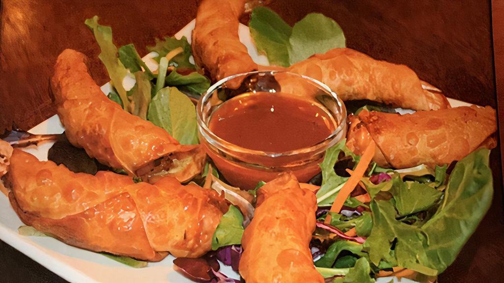 Fried Shrimp Wonton · Prawns wrapped in a wonton and deep fried, served with sweet and spicy dipping sauce.