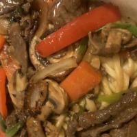 Spicy Mongolian Beef · Beef, white mushrooms, red bell pepper, carrots, onions and chives wok-tossed in a spicy tam...