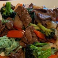 Broccoli Beef · Slices of beef, broccoli, shiitake mushrooms, red bell pepper, baby corn, onions and chives ...