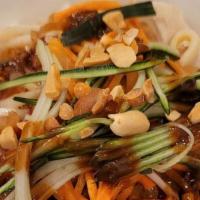 Peanut Noodles · Steamed egg noodles, sprouts, shredded carrots and cucumbers in a peanut sauce.